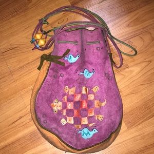 Colorful drawstring top, coin purse styled bag.